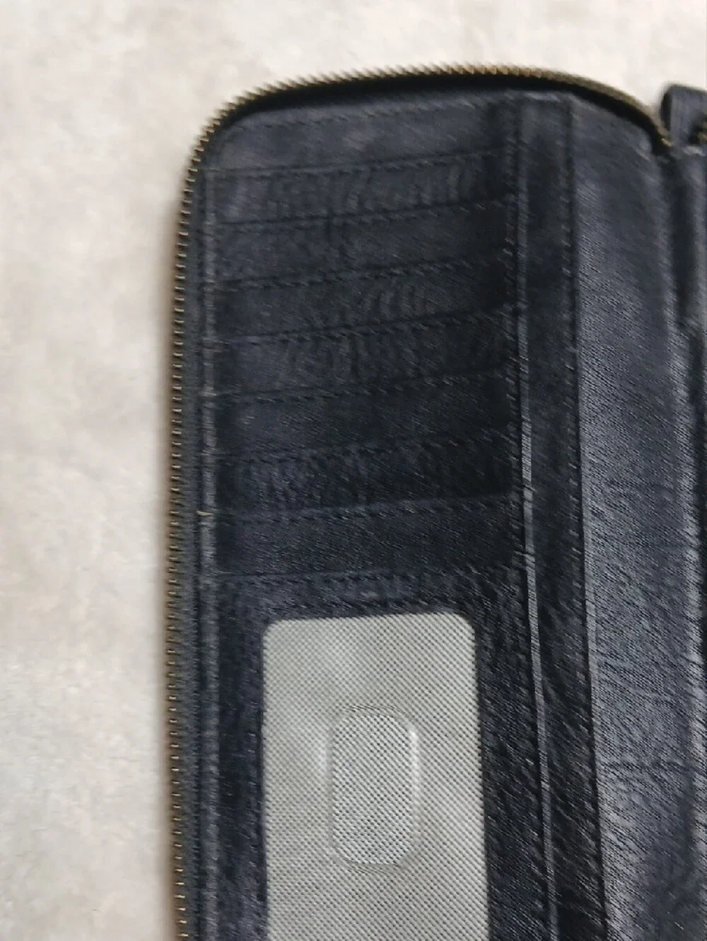 Fossil Black Leather Zip-Around Wallet with Gold Accent